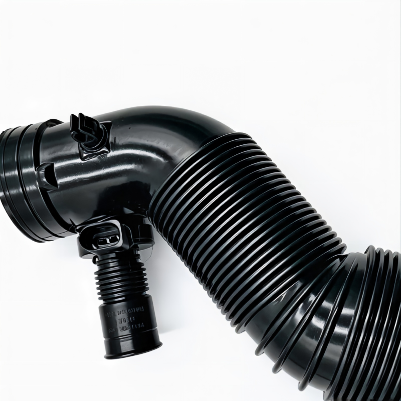 Black air intake hose assembly with corrugated tube, bracket mount, and connector