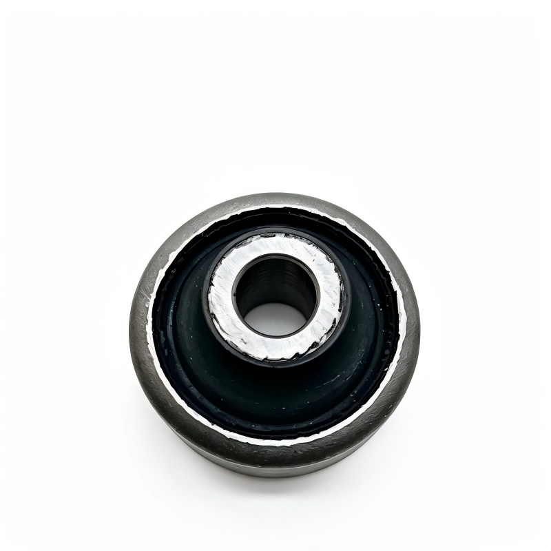 Control arm bushing with black rubber mount and silver metal inner sleeve ring
