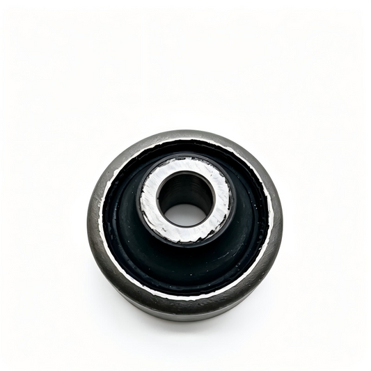 Control arm bushing with black rubber mount and silver metal inner sleeve ring