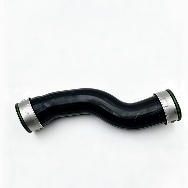 Turbo boost pipe with black rubber hose and silver metal couplers
