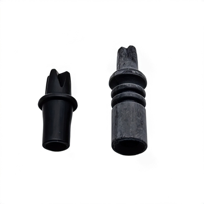 Black coolant hose parts: two rubber ends with ridged and smooth caps