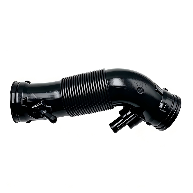 Black air intake hose with curved elbows and ribbed middle section